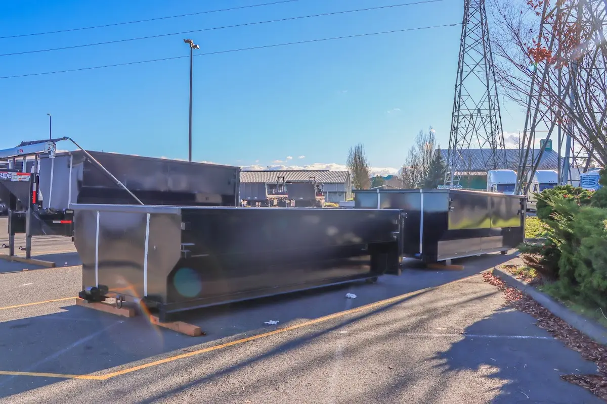 Roll-off dumpster ready for waste disposal at job site for 6 Yard Dumpster Rental in Springville